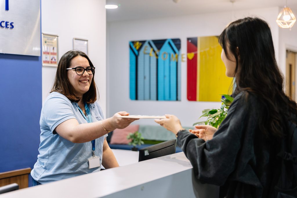 Student at acceptance desk